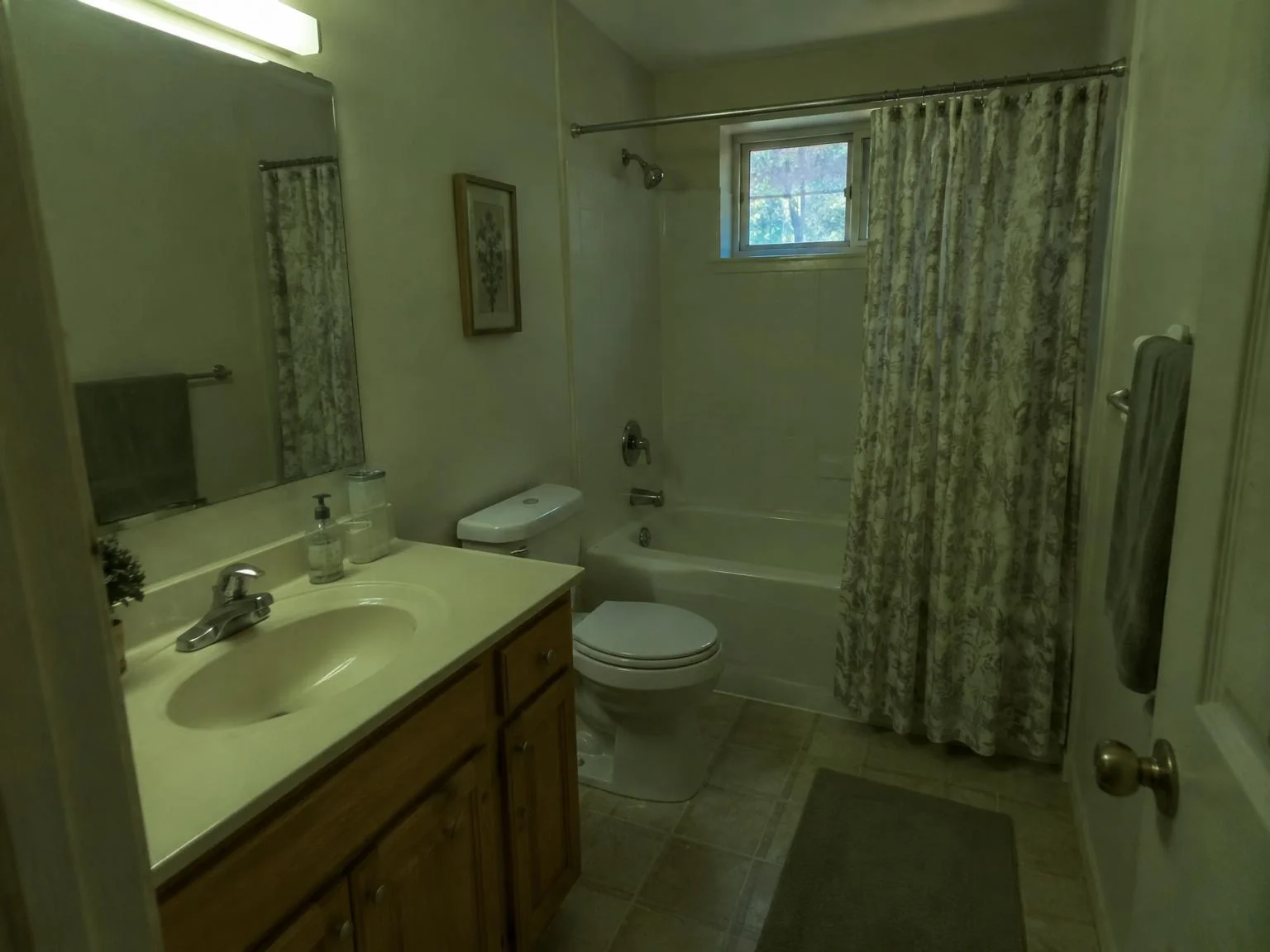 Before enhancement: greenish, underexposed bathroom photo