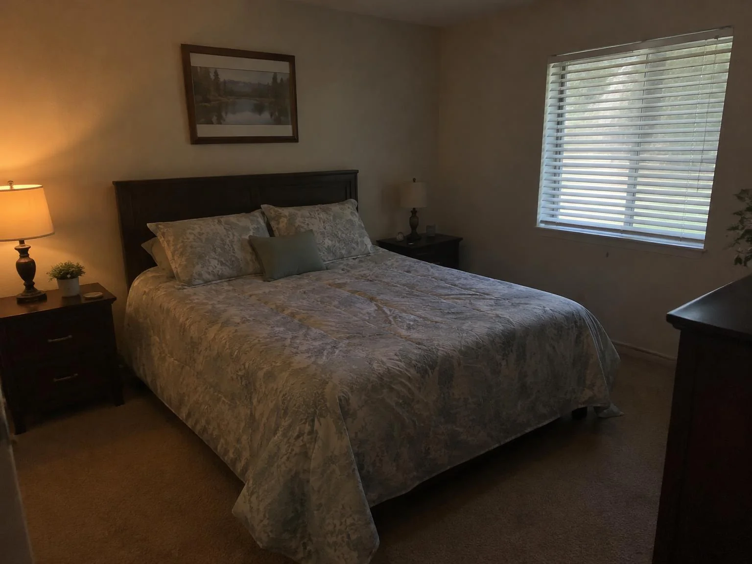Before enhancement: dim bedroom photo with a warm color cast